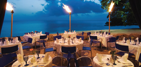 Bamboo Torches Set Around the Dining Area at Almond Resorts, Barbados Pocket Guide