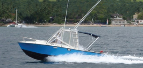 A Predator Sportfishing Vessel Heading Out to Sea, Barbados Pocket Guide
