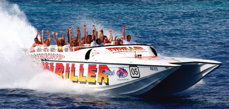Visitors Enjoying an Adventure Tour on board a Seafari Thriller Boat, Barbados Pocket Guide