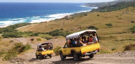 Adventureland 4X4 Jeeps on Tour Going Down a Steep Hill at East Coast, Barbados Pocket Guide