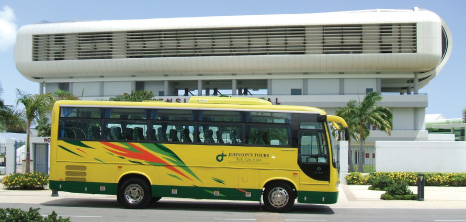 Johnson's Tours Bus Parked in front Kensington Oval, Bridgetown, St. Michael, Barbados Pocket Guide
