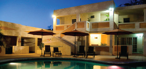 Pool View at Night, Ocean 15 Apartment Hotel, St. Lawrence Gap, Christ Church, Barbados