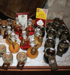 Crude Black Molasses & Other Products on Display at St. Nicholas Abbey, St. Peter, Barbados Pocket Guide