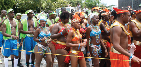 Revellers Dancing in the Streets on Grand Kadooment Day, Barbados Pocket Guide