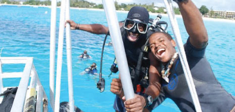 Two Divers Having a Great Time After Their Diving Experience with Barbados Blue, Barbados Pocket Guide