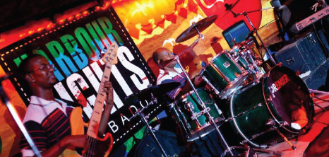Band Playing on Stage at Harbour Lights, Bay Street, St. Michael, Barbados Pocket Guide