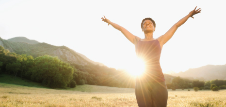 Woman with Hands Raised in the Air