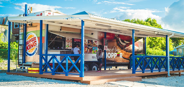 Waitresses at Cutters of Barbados Getting Ready to Serve Patrons, Barbados Pocket Guide