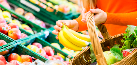 Lady Selecting Fruits in a Supermarket