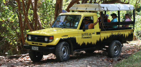 Adventureland 4 x 4 Tour Jeep Taking Visitors on an Adventure in the Countryside, Barbados Pocket Guide