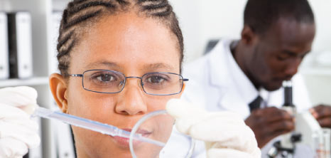 Lab Technicians Carrying Out Tests in a Lab, Barbados Pocket Guide