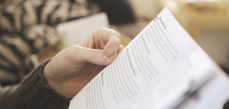 Student going through book