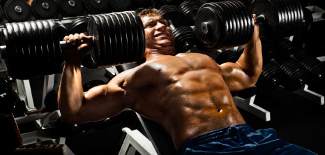 Bodybuilder Working Out at the Gym