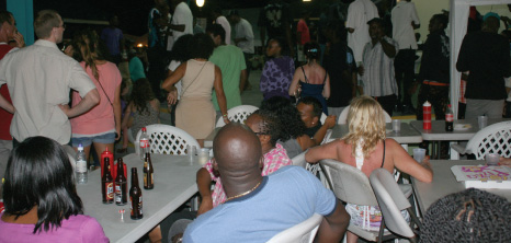 Locals & Visitors Liming at Oistins, Christ Church, Barbados Pocket Guide