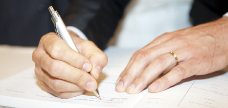 Groom Signing Wedding Contract